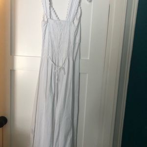 Long White cotton dress with swirled inlay.